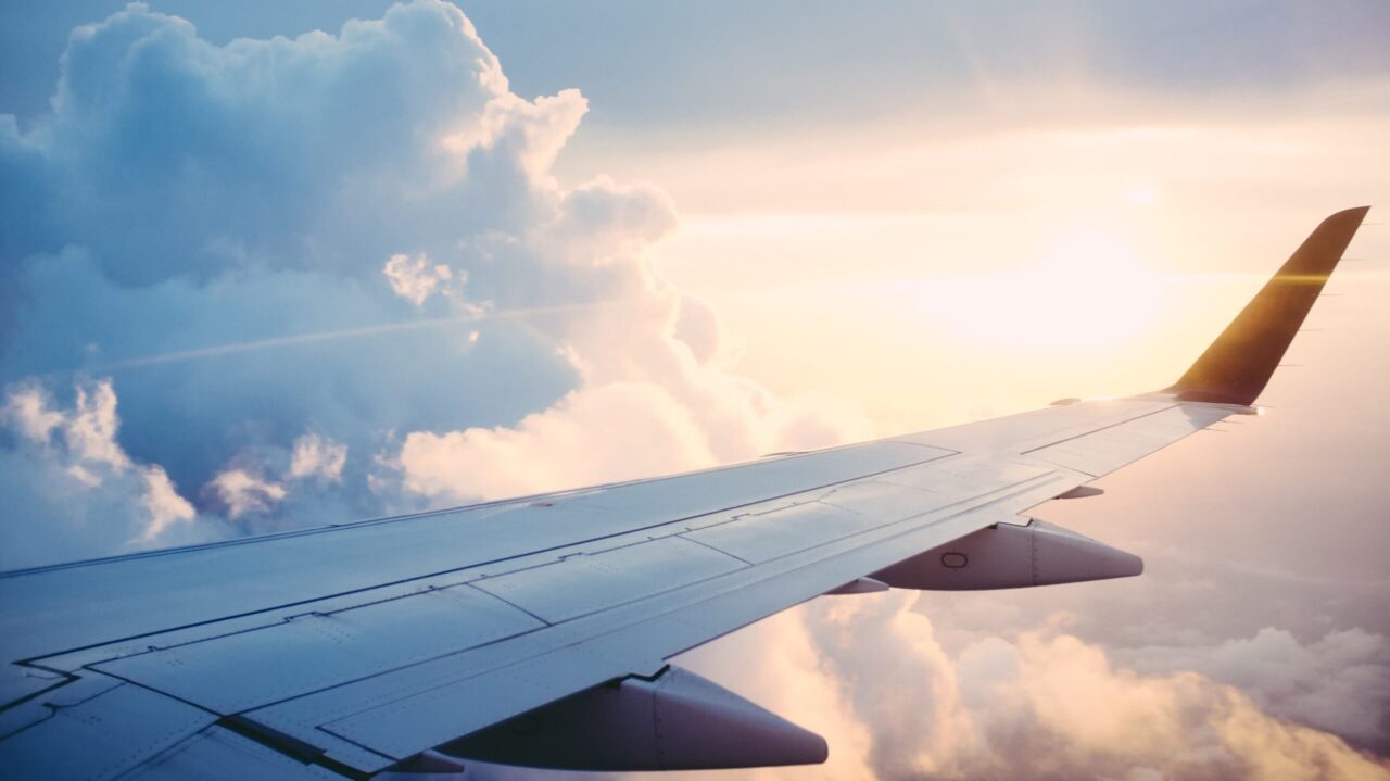 airplane wing in sky