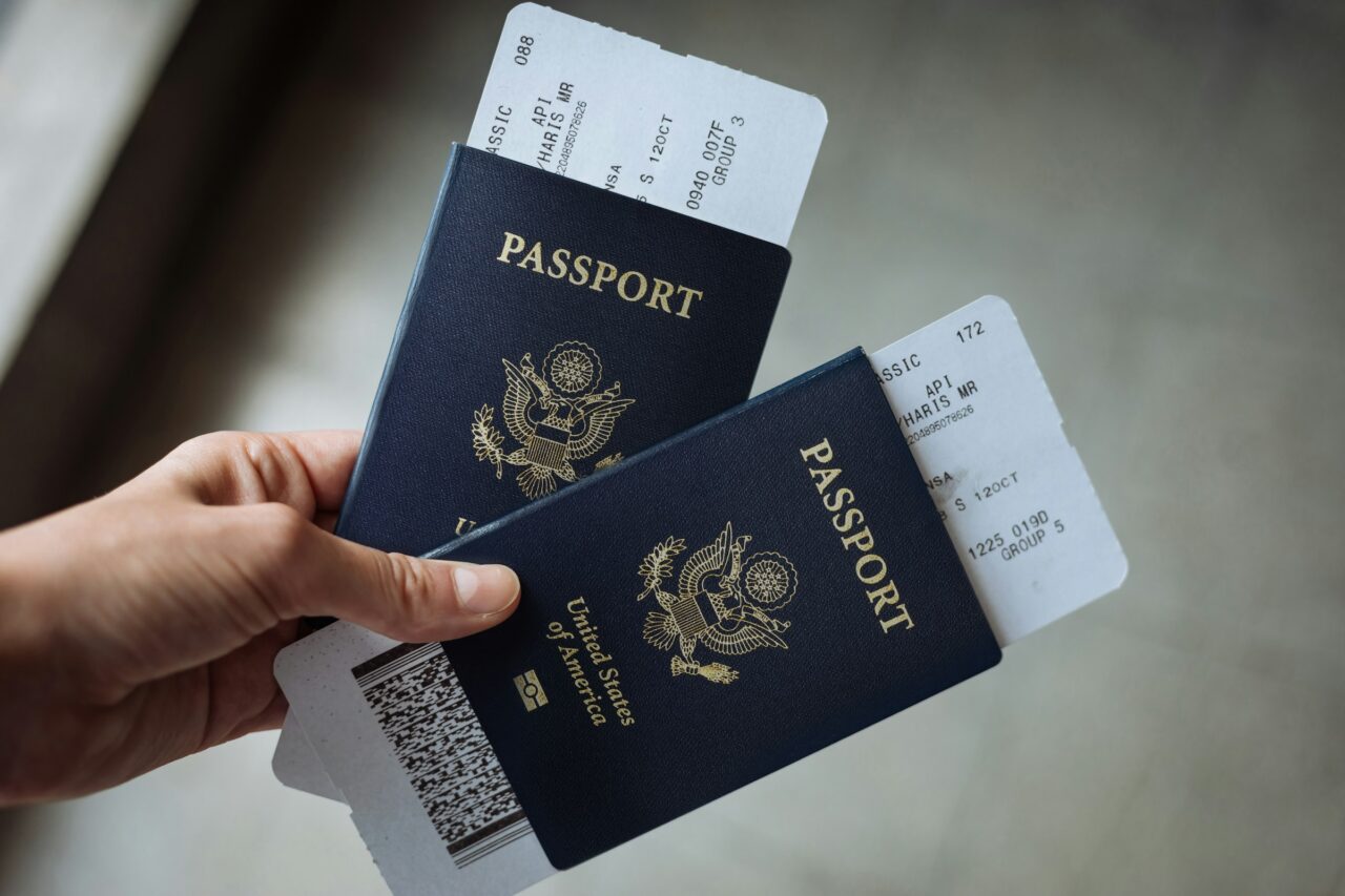 Hand holding a US Passport